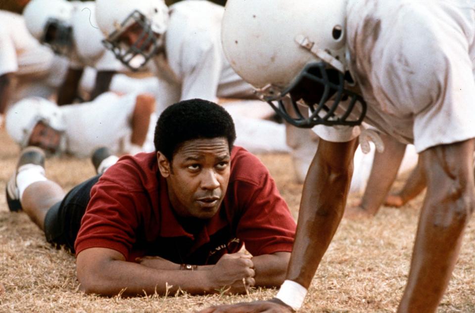 Coach Herman Boone (Denzel Washington) integrates a high school football team in Virginia in "Remember the Titans."