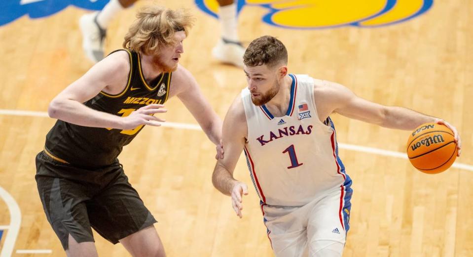 Missouri center Connor Vanover (75) gaurded Kansas big man Hunter Dickinson (1) during KU’s 73-64 win over Mizzou in Lawrence. The 7-foot-3 Vanover has played for three prior college teams, California, Arkansas and Oral Roberts.