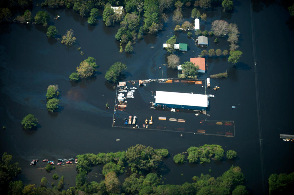 Flooding is seen in and around Wilmington, North Carolina, U.S., September 19, 2018 in this picture obtained from social media on September 21, 2018. ALAN CRADICK, CAPE FEAR RIVER WATCH/via REUTERS THIS IMAGE HAS BEEN SUPPLIED BY A THIRD PARTY. MANDATORY CREDIT. NO RESALES. NO ARCHIVES.