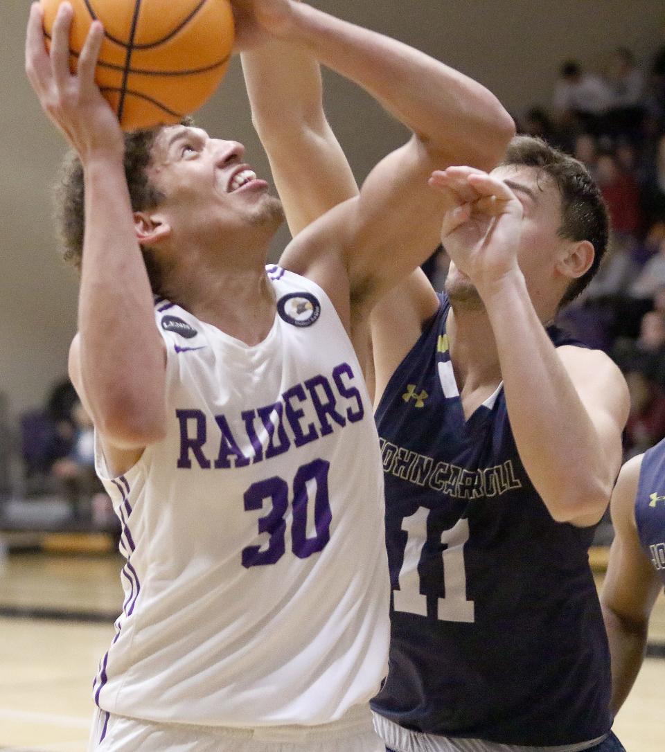 Braedon Poole (30) of Mount Union set a school record by playing in his 111th career game in a Purple Raider uniform on Wednesday.