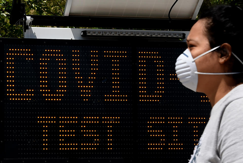 A patient walks-in at a Covid-19 testing site on May 12, 2020 in Arlington, Virginia. - Government epidemiologist Anthony Fauci stated, in testimony to US lawmakers, that even a cautious exit from the world's unprecedented economic shutdown could trigger a second coronavirus wave. Fauci admitted the true number killed by the epidemic in the US is likely higher than the official toll of 80,000 -- the world's highest. (Photo by Olivier DOULIERY / AFP) (Photo by OLIVIER DOULIERY/AFP via Getty Images)