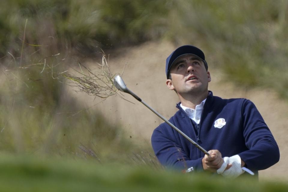 Team USA's Scottie Scheffler hits from the rough on the 14th hole during a practice day at the Ryder Cup at the Whistling Straits Golf Course Wednesday, Sept. 22, 2021, in Sheboygan, Wis. (AP Photo/Charlie Neibergall)