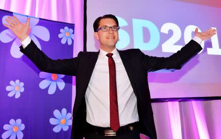 FILE PHOTO: Party leader Jimmie Akesson celebrates at the election night party of the Sweden Democrats in Stockholm, Sweden, September 14, 2014. Anders Wiklund/TT News Agency via REUTERS/File Photo