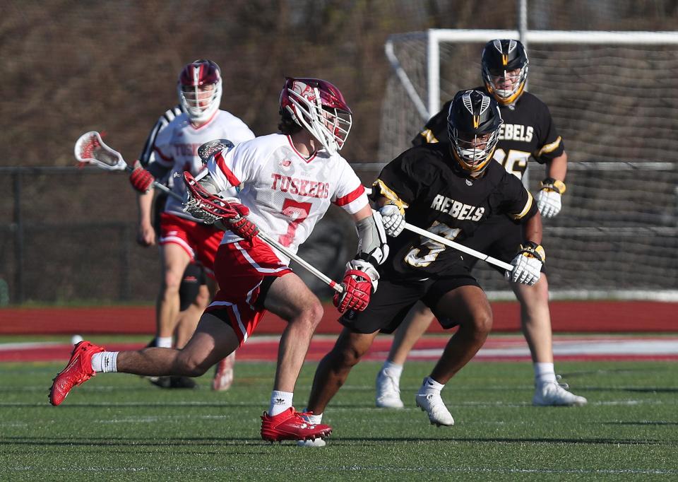 Somers Miguel Iglesias (7) drives to the goal against Lakeland/Panas during boys lacrosse action at Somers High School April 16. 2024. Somers won the game10-5.