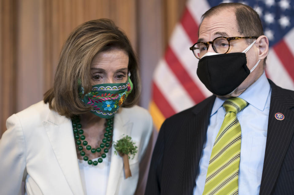 Speaker of the House Nancy Pelosi, D-Calif., left, confers with Rep. Jerrold Nadler, D-N.Y., the House Judiciary Committee chairman, at a news conference on reauthorizing the Violence Against Women Reauthorization Act, at the Capitol in Washington, Wednesday, March 17, 2021. (AP Photo/J. Scott Applewhite)