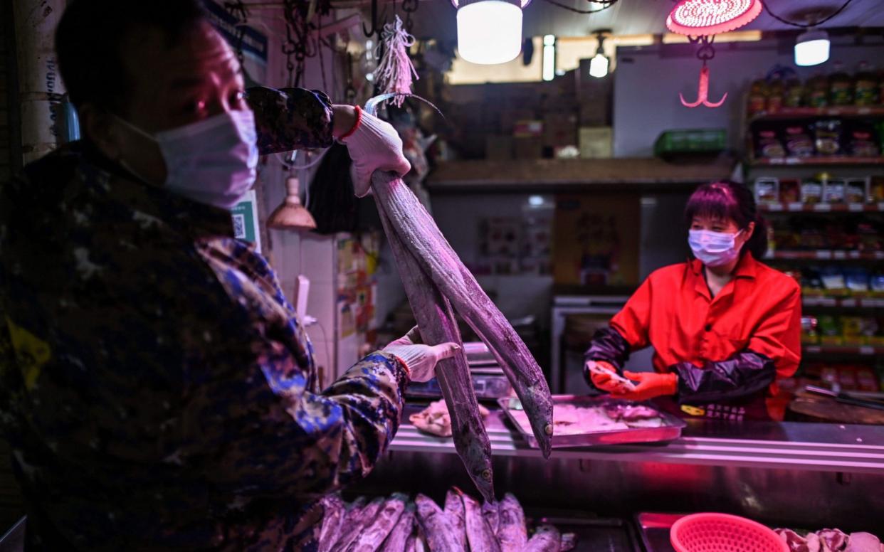 China says the coronavirus originated at a wet market in Wuhan - HECTOR RETAMAL/AFP/Getty Images