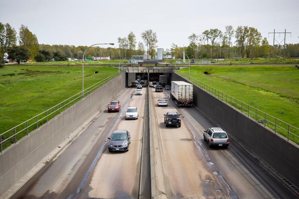 The George Massey Tunnel in Richmond, B.C., is pictured in 2019. Police are looking for the driver of a truck that hit the roof of the tunnel on Wednesday evening.  (Ben Nelms/CBC - image credit)