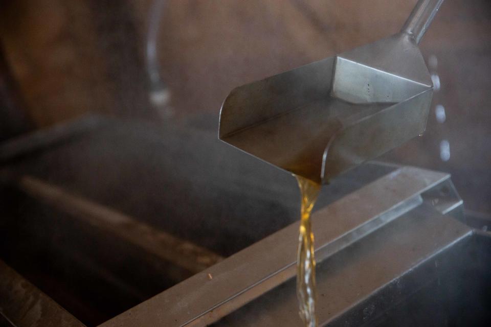 Early-stage maple syrup is shown during a demonstration for Maple Sugar Time on Saturday, March 18, 2023, at Van Raalte Farm in Holland.