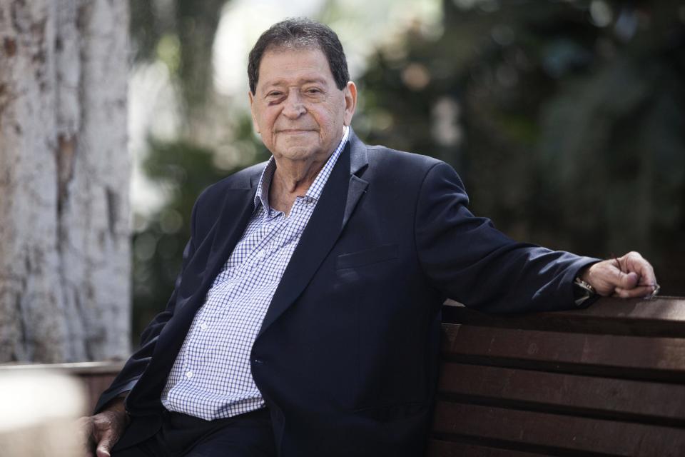 In this photograph taken on April 30, 2014, Binyamin Ben-Eliezer poses for a photo during an interview with The Associated Press in Tel Aviv, Israel. Ben-Eliezer is a former defense minister and one-time head of the Labor Party - another position Peres once held. Among those vying to become Israel's next president are a former defense minister, a former foreign minister, a former finance minister, a respected long-serving lawmaker and a Nobel Prize winner. Amazingly, the man they all seek to replace has held all of those titles and more during a legendary 65-year political career. (AP Photo/Dan Balilty)
