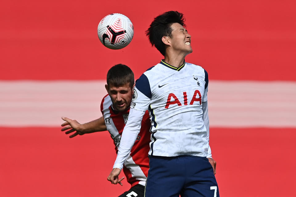 Southampton's English defender Jack Stephens (L) vies with Tottenham Hotspur's South Korean striker Son Heung-Min (R) during the English Premier League football match between Southampton and Tottenham Hotspur at St Mary's Stadium in Southampton, southern England on September 20, 2020. (Photo by JUSTIN TALLIS / POOL / AFP) / RESTRICTED TO EDITORIAL USE. No use with unauthorized audio, video, data, fixture lists, club/league logos or 'live' services. Online in-match use limited to 120 images. An additional 40 images may be used in extra time. No video emulation. Social media in-match use limited to 120 images. An additional 40 images may be used in extra time. No use in betting publications, games or single club/league/player publications. / (Photo by JUSTIN TALLIS/POOL/AFP via Getty Images)