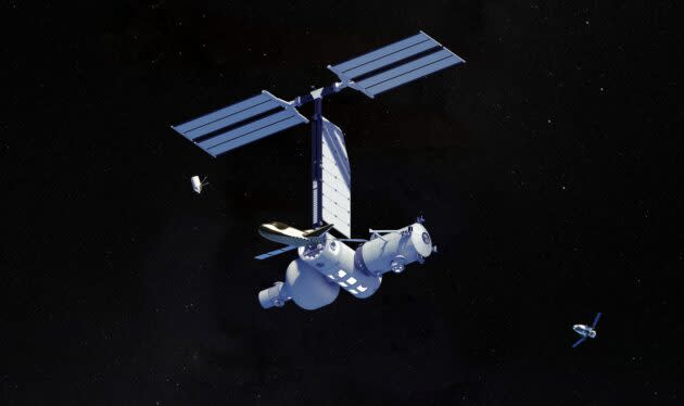 An artist’s conception shows the Orbital Reef space station with a single-person spacecraft and Boeing’s Starliner space taxi flying nearby, and Sierra Space’s Dream Chaser space plane docked to a port. (Orbital Reef Illustration)