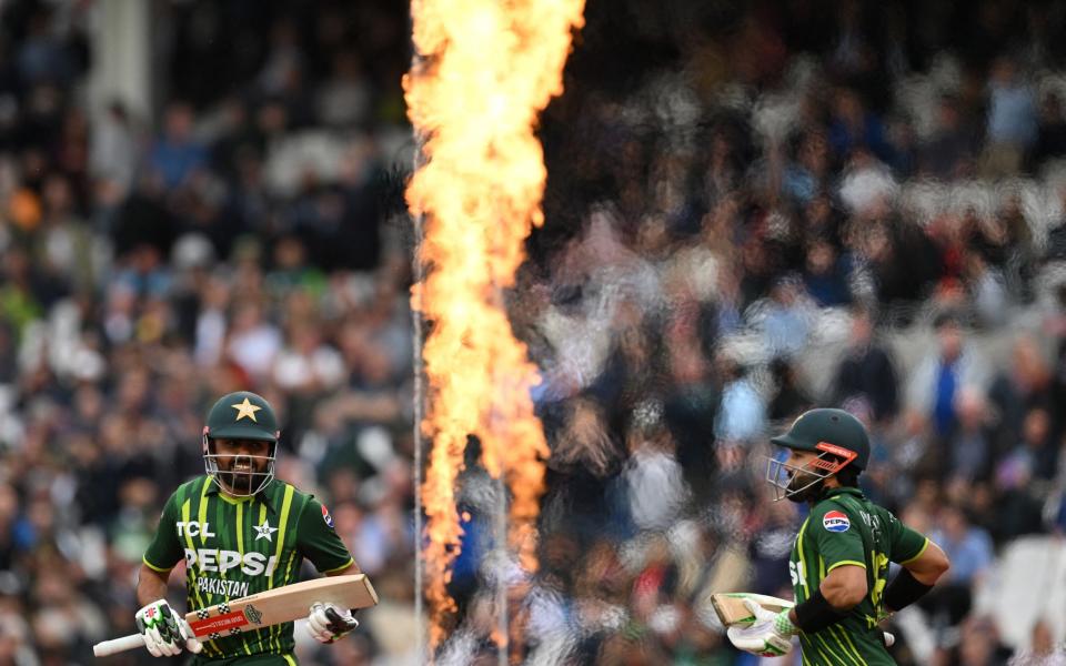 Babar Azam and Mohammad Rizwan walk out to the middle