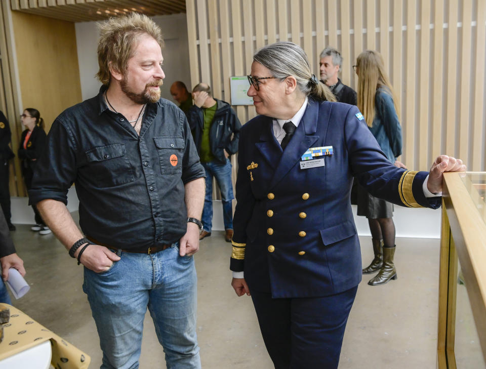 Vrak – Museum of Wrecks' marine archaeologist, Jim Hansson and Head of Navy, Ewa Skoog Haslum talk together after the discovery of the shipwreck The Apple, that has been found outside of Vaxholm, in Stockholm, Sweden, Monday, Oct. 24, 2022. (Jonas Ekströmer/TT News Agency via AP)