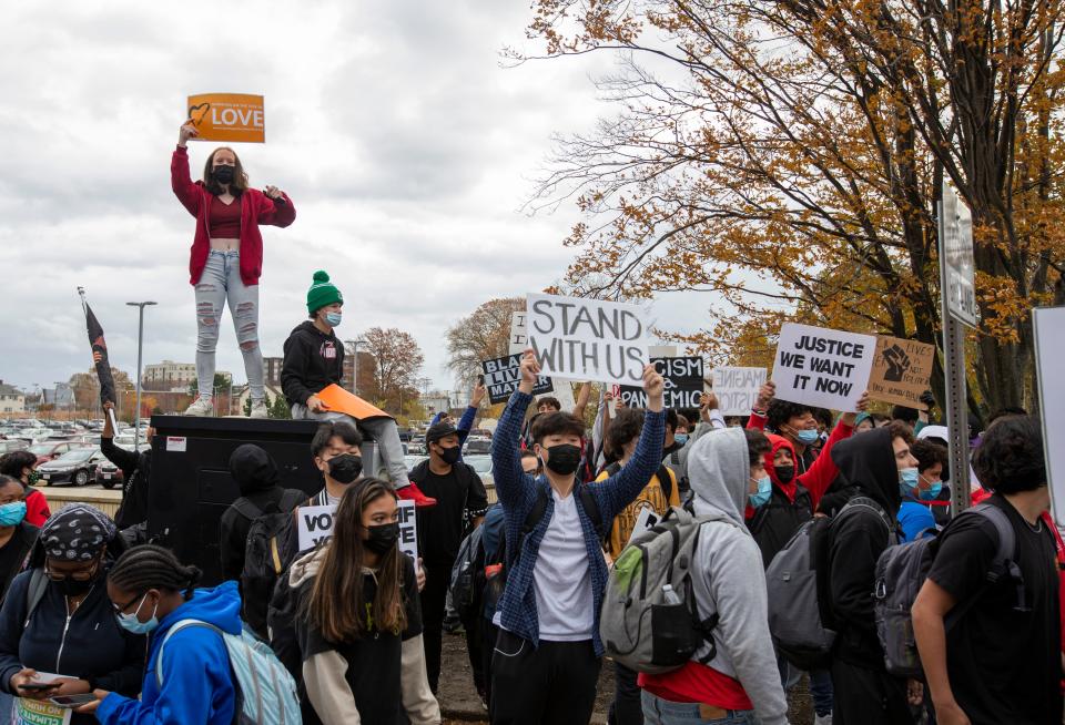 Quincy High School students hit the streets during a walkout protesting racism at the school on Nov. 12, 2021.