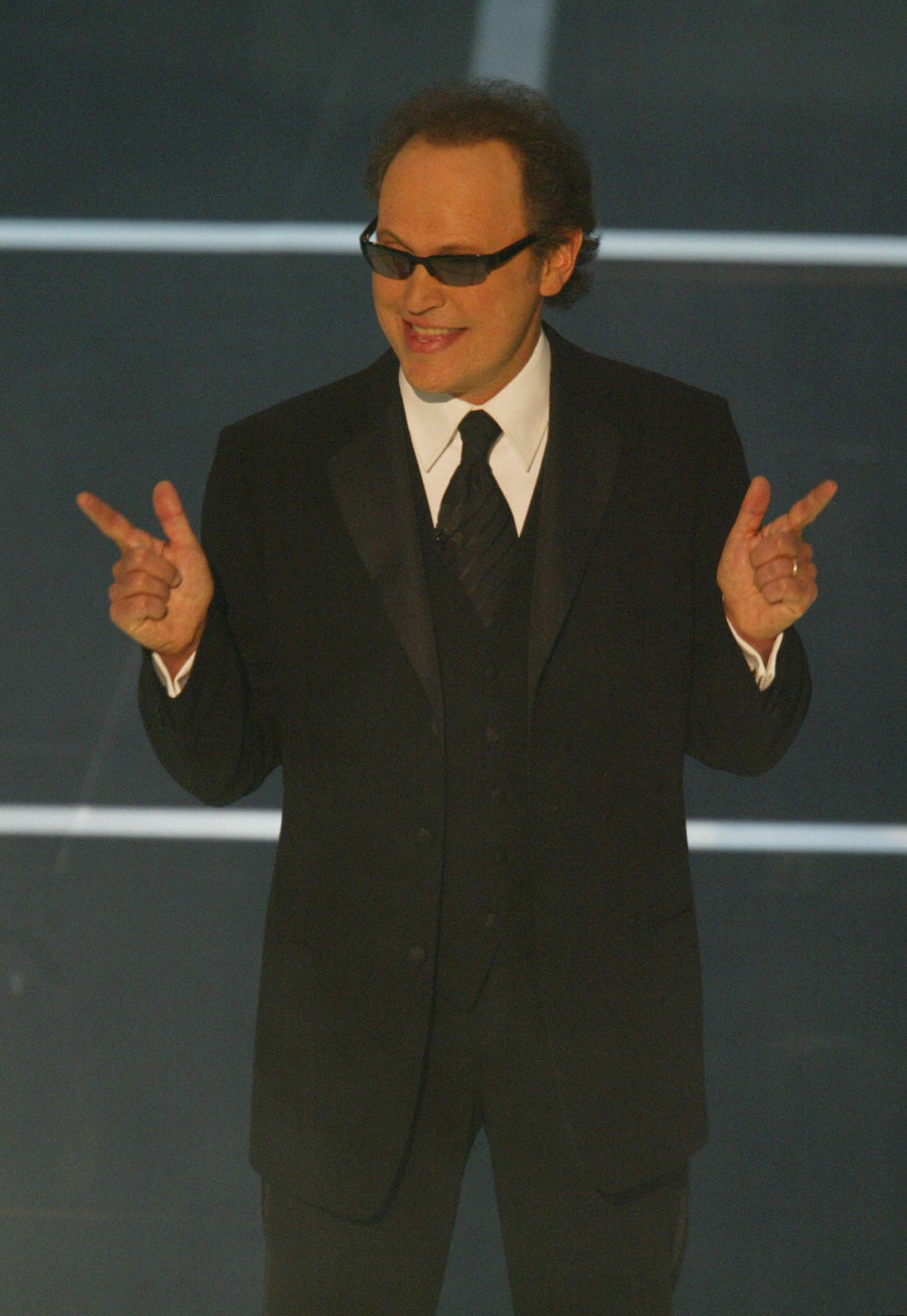 Oscar host Billy Crystal onstage at the 2004 Oscars.
