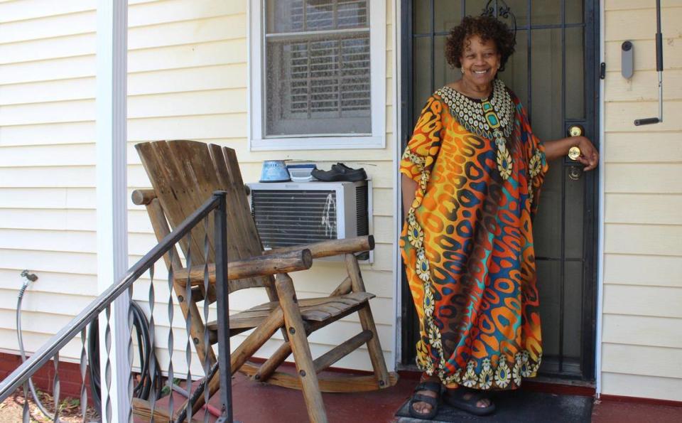 Lauraetta Jackson, 74, poses on her porch after taking a break from cleaning her rugs on Monday, June 17, 2024, in Macon, Georgia. Jackson called herself “stupid” for getting pregnant at 16 years old.