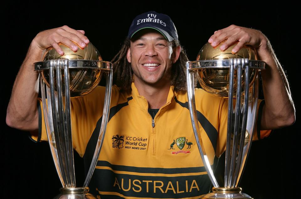 Andrew Symonds, pictured here with the 2003 and 2007 World Cup trophies.