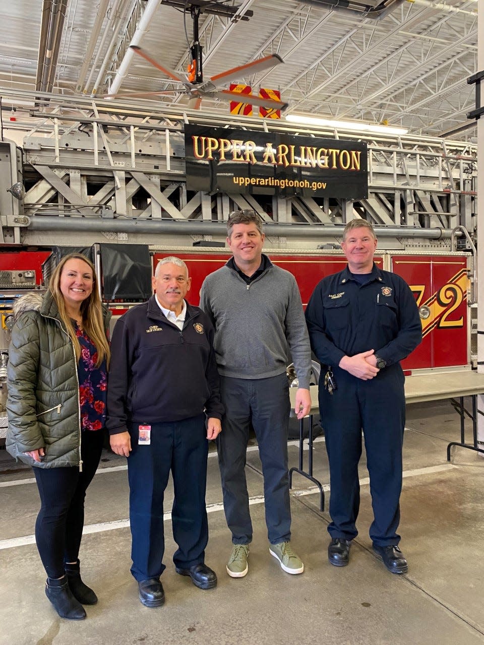 Upper Arlington Fire Division Assistant Chief Christopher Zimmer (far right) will take over as chief March 10 after 23 years on the force. He will succeed Lyn Nofziger (second from left), who has been with the UAFD 34 years, including the past six as chief. Also pictured are Assistant City Manager Jackie Thiel (left) and City Manager Steve Schoeny.