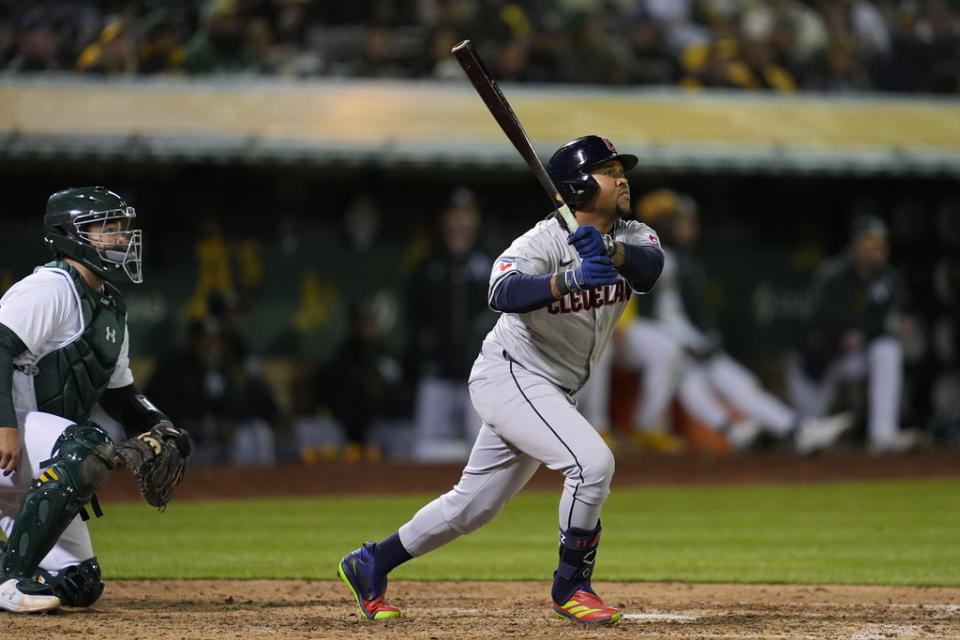 Cleveland Guardians’ José Ramírez watches his RBI triple during the ninth inning of the team’s baseball game against the Oakland Athletics, Thursday, March 28, 2024, in Oakland, Calif. (AP Photo/Godofredo A. Vásquez)