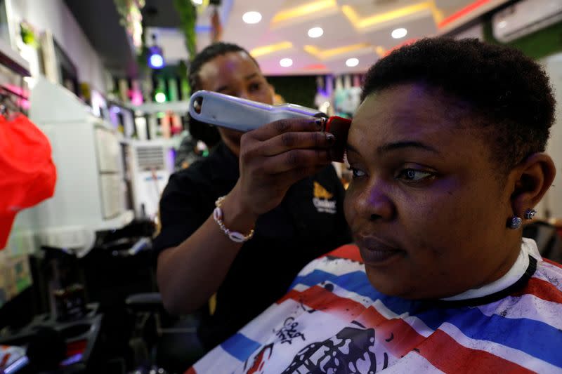 The Wider Image: Nigeria's female bouncers show their strength fighting stereotypes