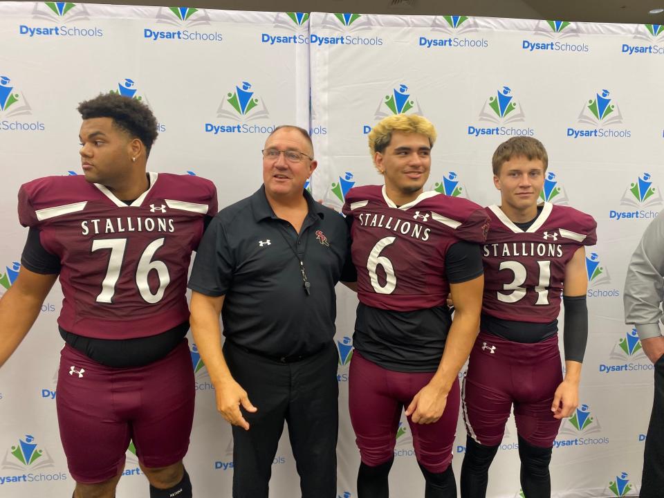 New Shadow Ridge football coach Mike Zdebski brought Camden Lamar Brown (No. 76), Xavier Armenta (No. 6) and Max Cauley to the first Dysart district football media day on Aug. 7, 2024.