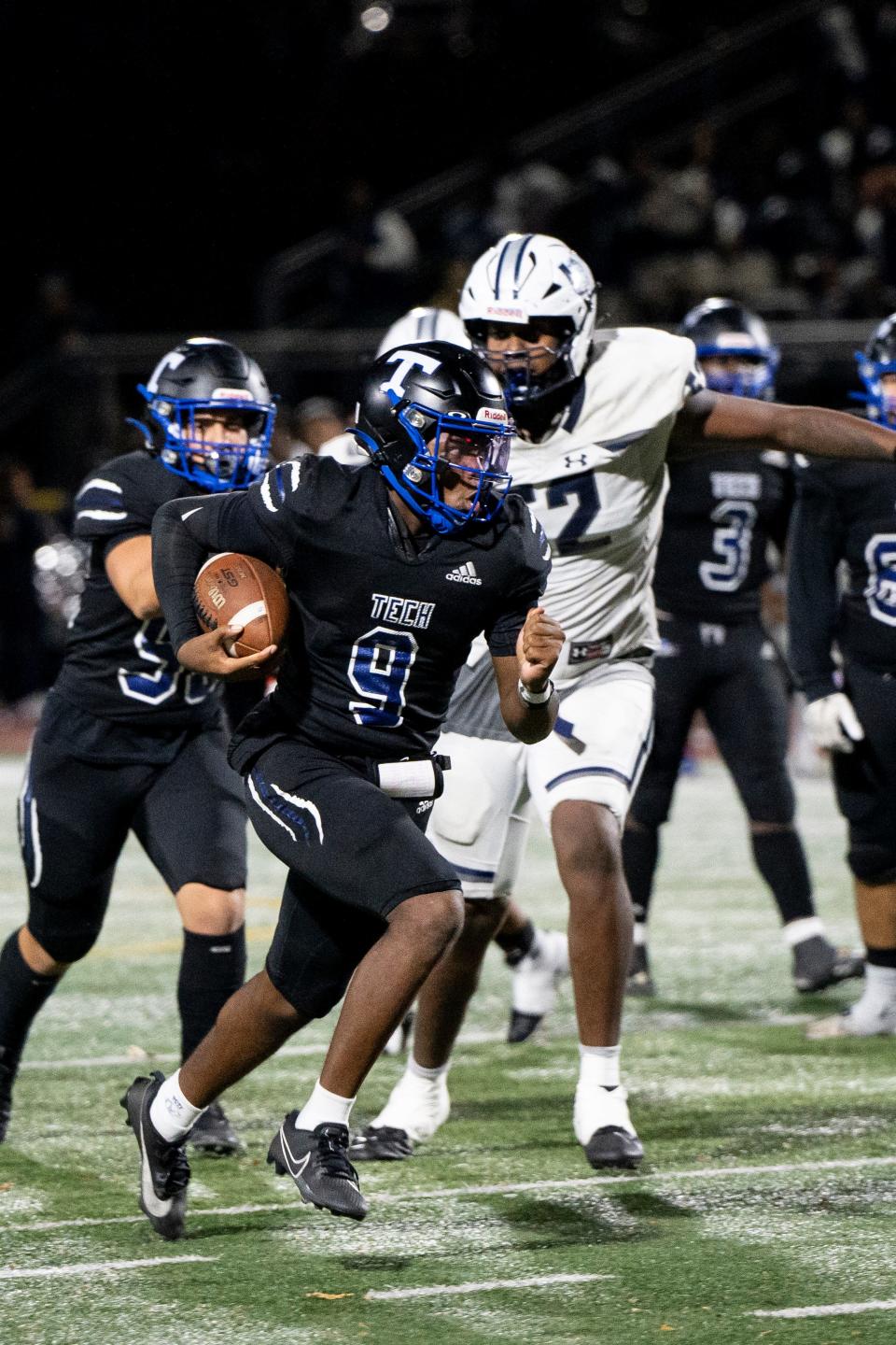 PT #9 Ma'Kao Taylor with the ball. Passaic Tech hosts Union City in Group 5 football semifinal in Wayne, NJ on Friday, November 17, 2023.