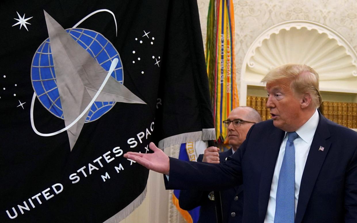 <p>Biden press secretary apologises for Space Force jibe - but is it just a bizarre Trump project?</p> (Samuel Corum-Pool/Getty Images)
