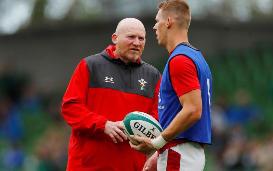 Wales coach Neil Jenkins passes on advice to full-back Liam Williams - REUTERS