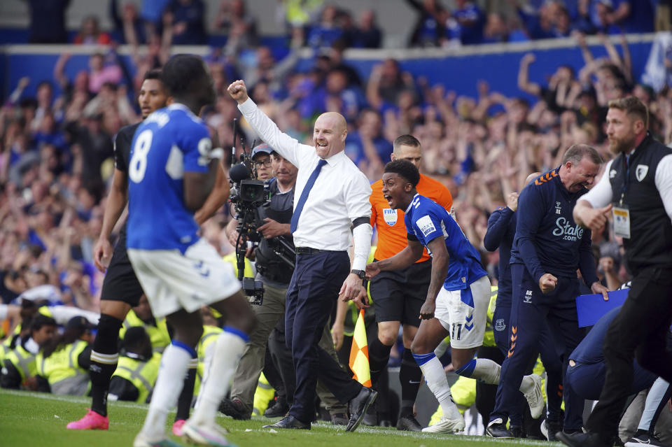 Everton manager Sean Dyche celebrates securing their place in the Premier League after the English Premier League soccer match between Everton and Bournemouth at Goodison Park, Liverpool, England, Sunday May 28, 2023. (Peter Byrne/PA via AP)