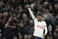 Tottenham's Emerson Royal celebrates after scoring his side's opening goal during the English Premier League soccer match between Tottenham Hotspur and West Ham United at Tottenham Hotspur stadium in London, Sunday, Feb. 19, 2023. (AP Photo/Kirsty Wigglesworth)