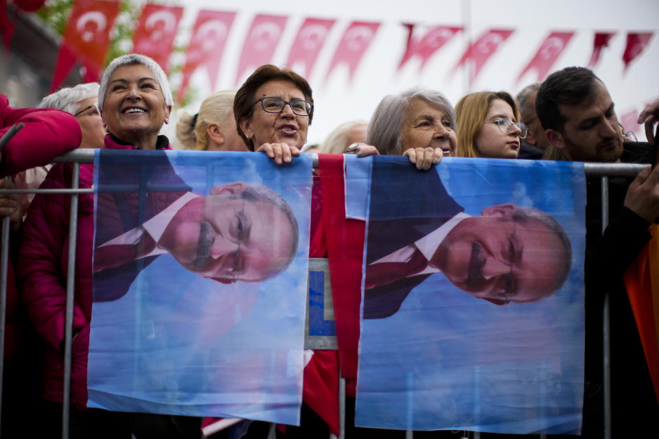 People listen to Kemal Kilicdaroglu, leader of Turkey's main opposition Republican People's Party, CHP, during a campaign rally in Tekirdag, Turkey, on Thursday, April 27, 2023. Kilicdaroglu, the main challenger to President Recep Tayyip Erdogan in the May 14 election, cuts a starkly different figure than the incumbent who has led the country for two decades. As the polarizing Erdogan has grown increasingly authoritarian, Kilicdaroglu has a reputation as a bridge builder and vows to restore democracy. (AP Photo/Francisco Seco)