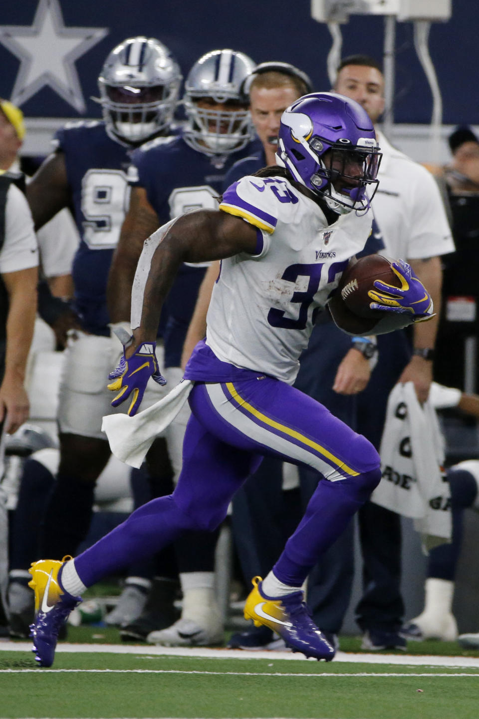 Minnesota Vikings running back Dalvin Cook (33) carries the ball during the second half of the team's NFL football game against the Dallas Cowboys in Arlington, Texas, Sunday, Nov. 10, 2019. (AP Photo/Michael Ainsworth)