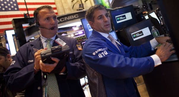 new york stock exchange traders investing wall street earnings