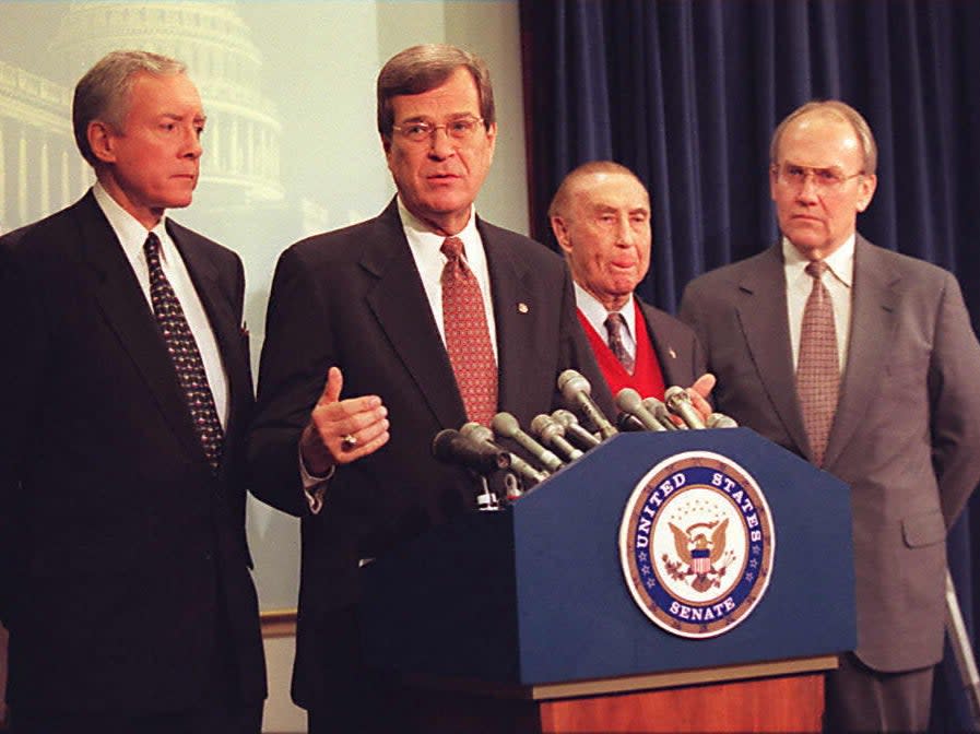 Senate Majority Leader Trent Lott introduces Senators Orrin Hatch of Utah, Strom Thurmond of South Carolina, and Larry Craig of Idaho on 27 January 1997.  (AFP via Getty Images)