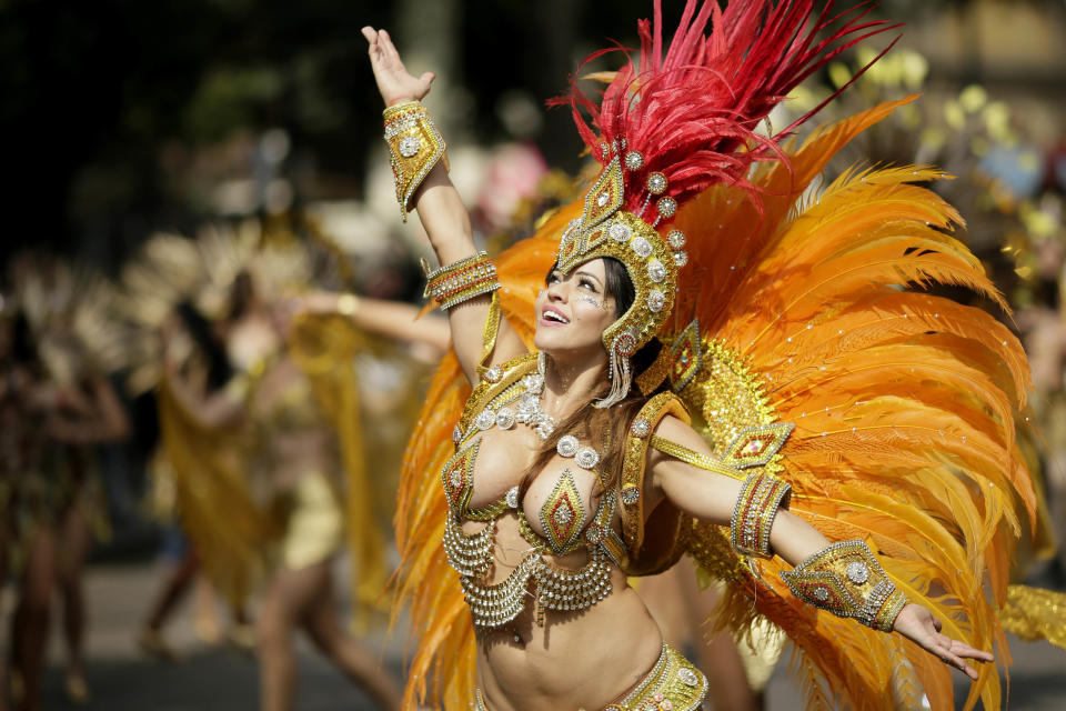 Costumed revellers perform in the parade during the Notting Hill Carnival in London, Monday, Aug. 27, 2018. (Photo: Tim Ireland/AP)