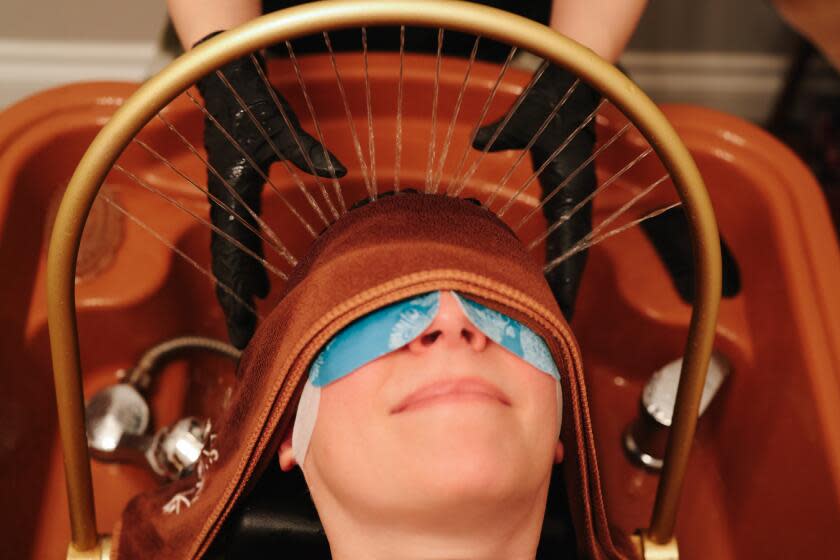 Temple City, CA - February 12: Reporter Deborah Vankin receives a Chinese scalp treatment from Tou Dao Tang Head Spa on Monday, Feb. 12, 2024 in Temple City, CA. (Dania Maxwell / Los Angeles Times)