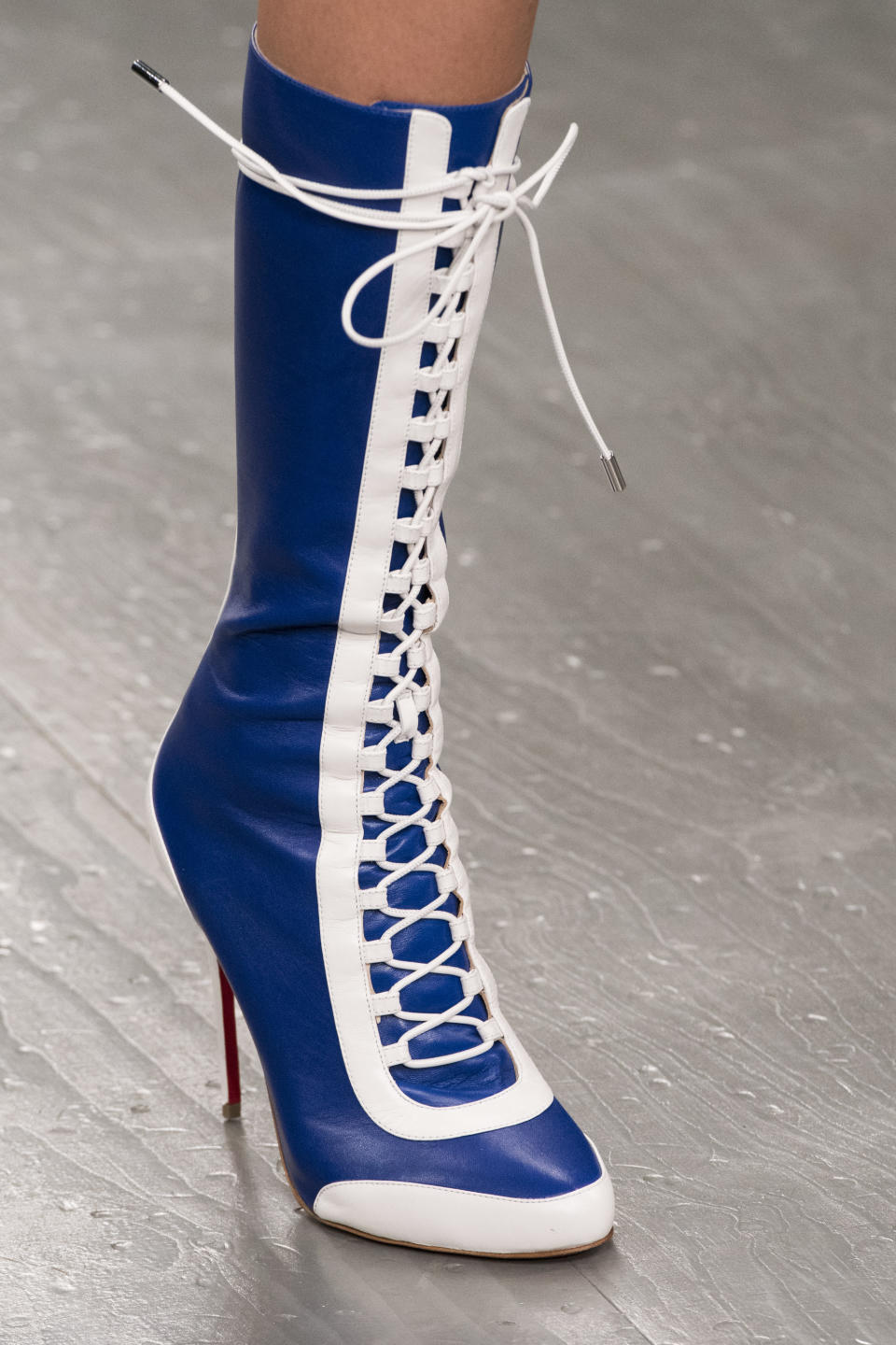 <p><i>Blue-and-white lace-up boots from the SS18 David Koma collection. (Photo: ImaxTree) </i></p>