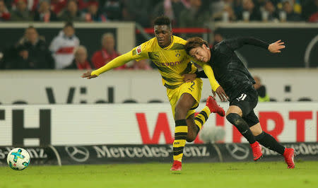 Soccer Football - Bundesliga - VfB Stuttgart vs Borussia Dortmund - Mercedes-Benz Arena, Stuttgart, Germany - November 17, 2017 Borussia Dortmund’s Dan-Axel Zagadou in action with Stuttgart's Takuma Asano REUTERS/Thomas Niedermueller