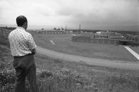 <p>A guard watches over the minimum security prison at Allenwood, Pa., July 1, 1974, where several Watergate felons were held. (Photo: Paul Vathis/AP) </p>