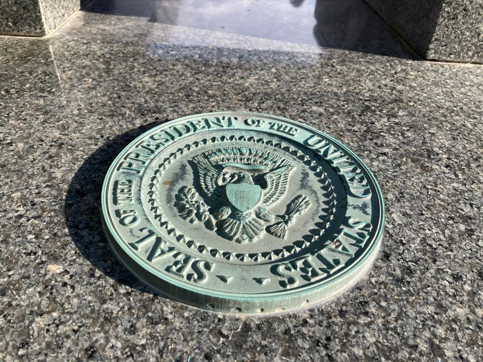 A presidential seal is shown Feb. 12, 2022 at the gravesite of Chester Alan Arthur, the Vermont-born 21st president of the United States, at Albany Rural Cemetery outside Albany, New York.