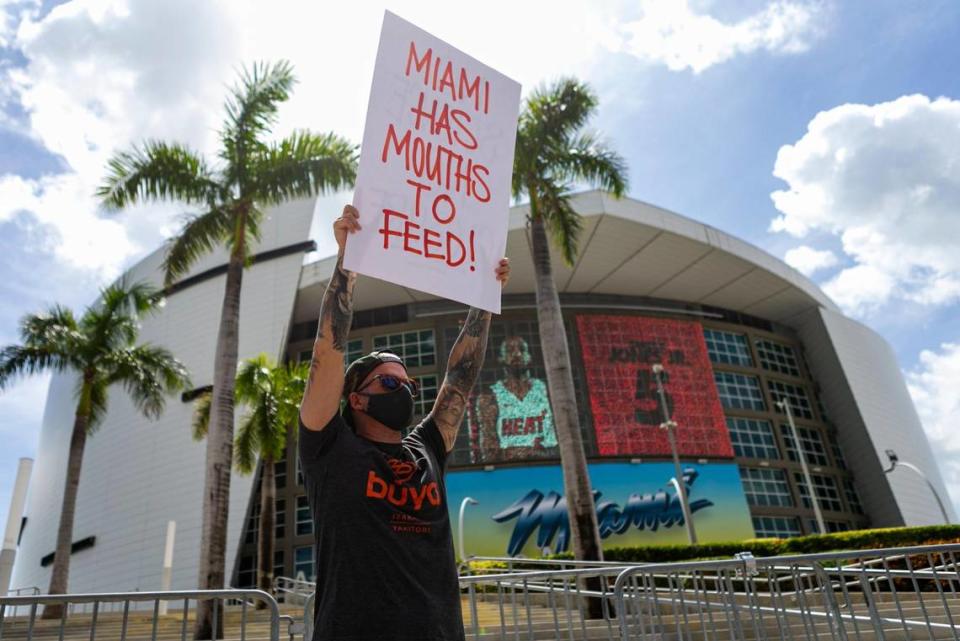 Jeff Grosser, 41, owner of Buya Izakaya, attends a rally in front of AmericanAirlines Arena in downtown Miami on Friday, July 10, 2020, to protest Miami-Dade County Mayor Carlos Gimenez’s order to close inside dining at restaurants to avoid the spread of the coronavirus.