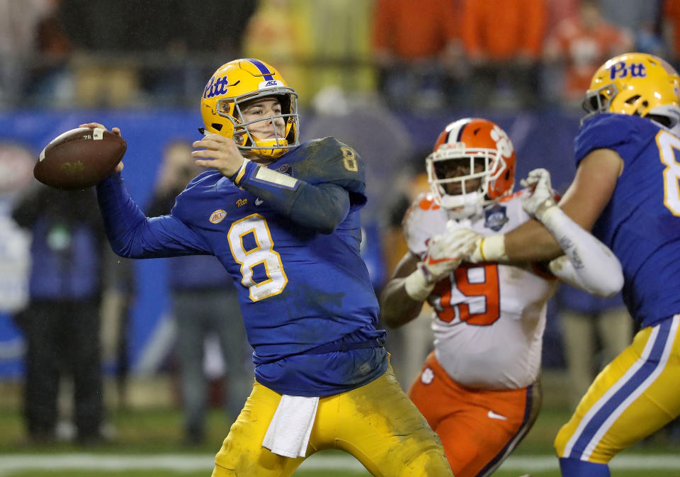 CHARLOTTE, NC - DECEMBER 01:  Kenny Pickett #8 of the Pittsburgh Panthers drops back to pass against the Clemson Tigers during their game at Bank of America Stadium on December 1, 2018 in Charlotte, North Carolina.  (Photo by Streeter Lecka/Getty Images)