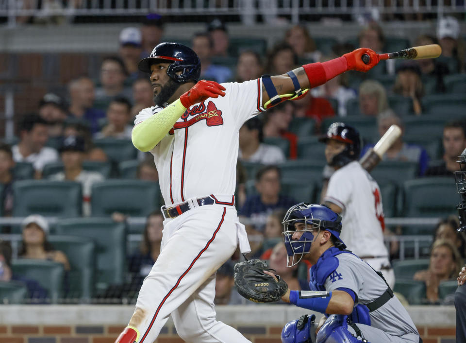 Atlanta Braves' Marcell Ozuna through on a two-run home run against the Los Angeles Dodgers during the eighth inning of a baseball game Saturday, June 25, 2022, in Atlanta. (AP Photo/Bob Andres)