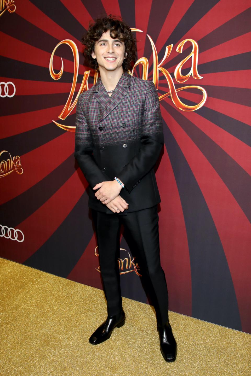 Timothee Chalamet, Tom Ford, boots, black boots, leather boots, mens boots, menswear, suit, printed suit, Cartier, necklace, bracelet, friendship bracelet, Wonka, red carpet, celebrity red carpet, Toronto, Ontario, Canada