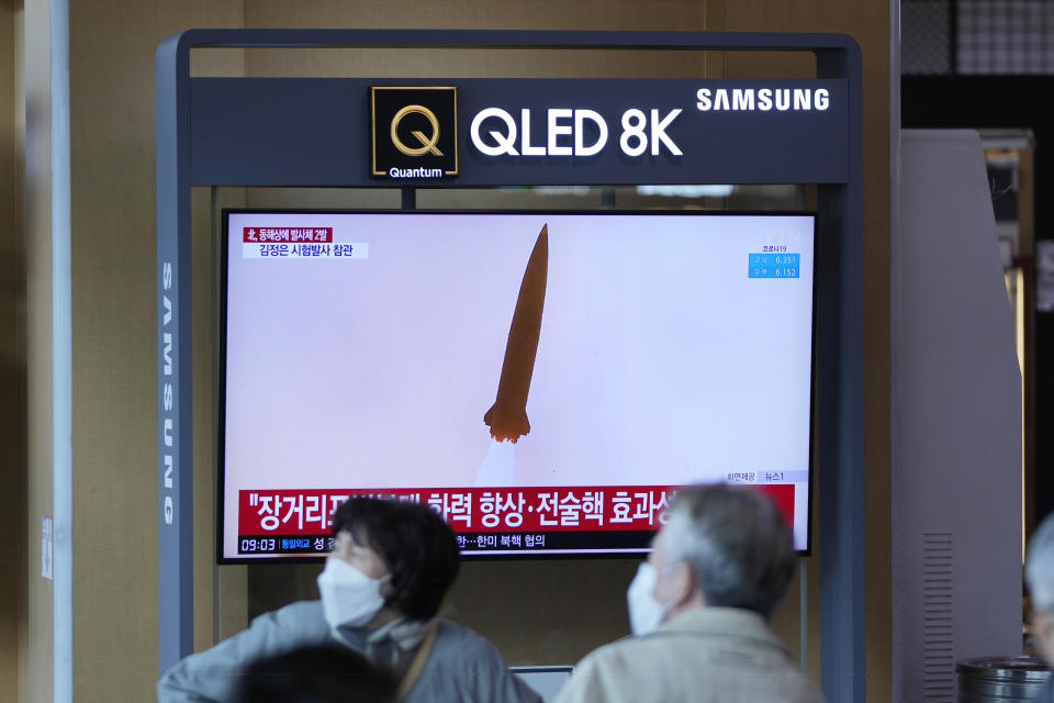 A TV screen shows a news program reporting about a test-firing of a newly developed tactical guided weapon, at a train station in Seoul, South Korea, Sunday, April 17, 2022. North Korea said Sunday it has successfully test-fired a newly developed tactical guided weapon, the latest in a spate of launches that came just after the country passed its biggest state anniversary without an expected military parade, which it typically uses to unveil provocative weapons systems. (AP Photo/Lee Jin-man)