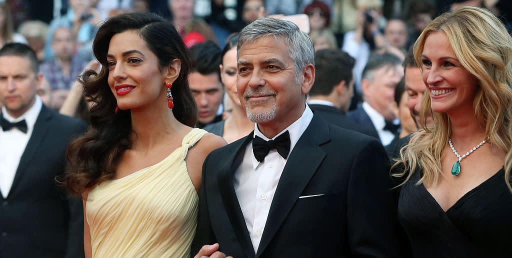 cannes, france   may 12  actor george clooney, his wife amal clooney and actress julia roberts attend the money monster premiere during the 69th annual cannes film festival at the palais des festivals on may 12, 2016 in cannes, france  photo by danny martindalefilmmagic