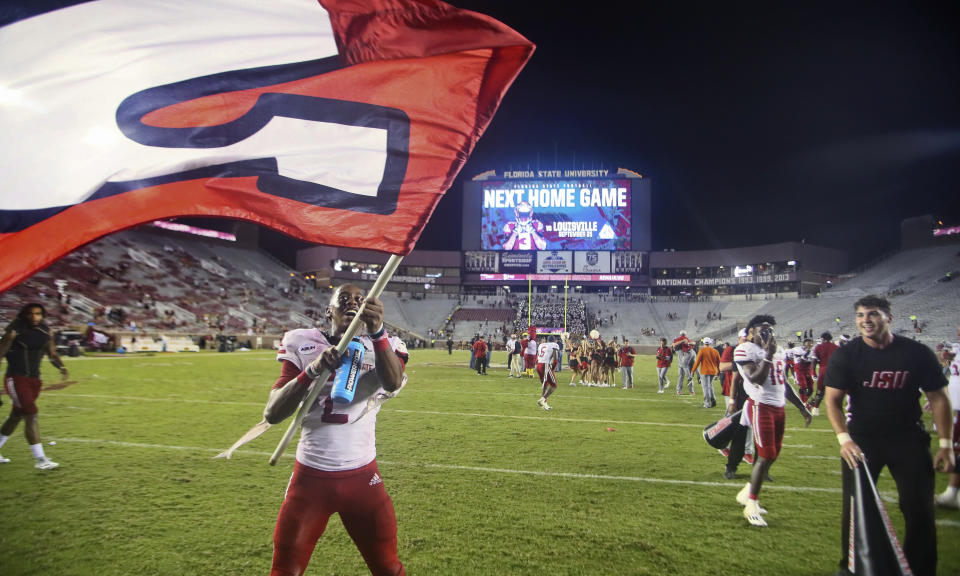 Jacksonville State wide receiver Michael Pettway (2) waves a flag on the field after the team's 20-17 win over Florida State in an NCAA college football game Saturday, Sept. 11, 2021, in Tallahassee, Fla. (AP Photo/Phil Sears)