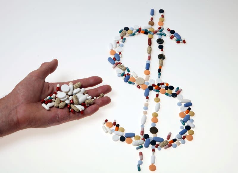 FILE PHOTO: Pharmaceutical tablets and capsules are arranged on a table in this picture illustration taken in Ljubljana