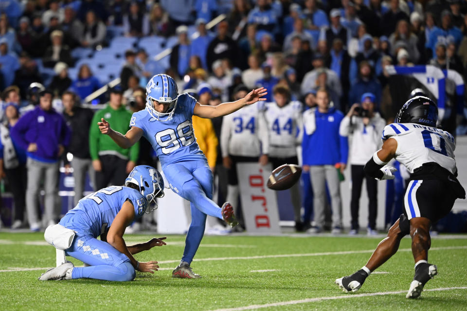 Nov 11, 2023; Chapel Hill, North Carolina, USA; North Carolina Tar Heels place kicker Noah Burnette (98) kicks a field goal in the first quarter at Kenan Memorial Stadium. Mandatory Credit: Bob Donnan-USA TODAY Sports