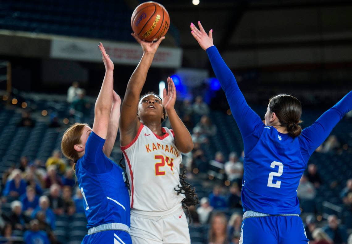 Kamiakin forward Camia Howard (24) puts up a shot in the fourth quarter against Lynnwood in the opening round of the Class 4A girls state basketball tournament on Wednesday, March 1, 2023 at the Tacoma Dome in Tacoma, Wash.